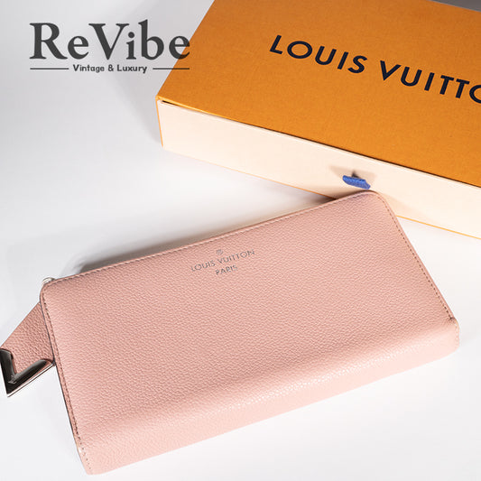 LOUIS VUITTON  ルイヴィトン ポルトフォイユコメット 長財布 財布 トリヨンレザー レディース ピンク系 M63103